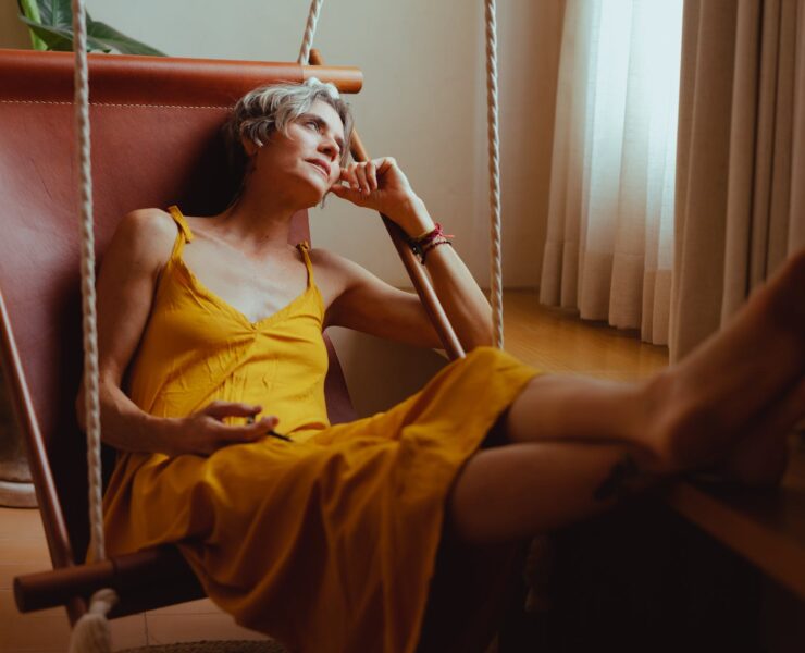 elderly woman relaxing on her hammock