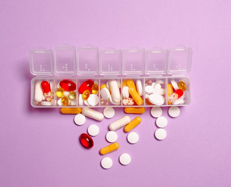 photo medication pills on white plastic container
