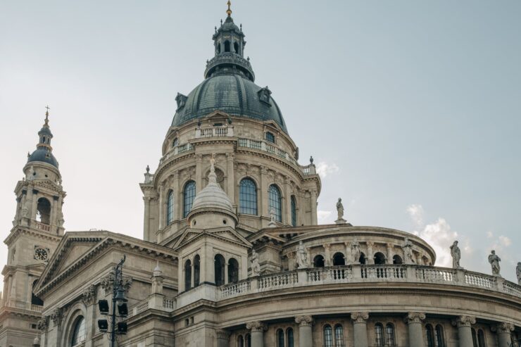 brown concrete building under blue sky