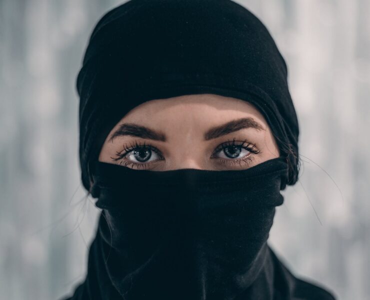 person wearing black mask