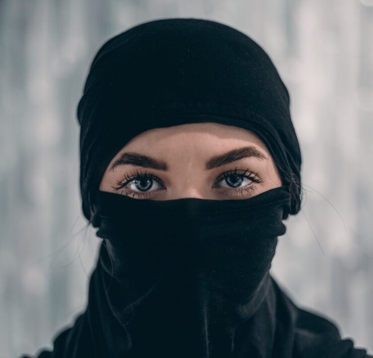 person wearing black mask