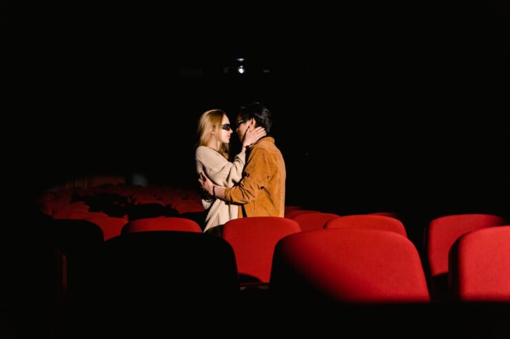 a couple kissing each other