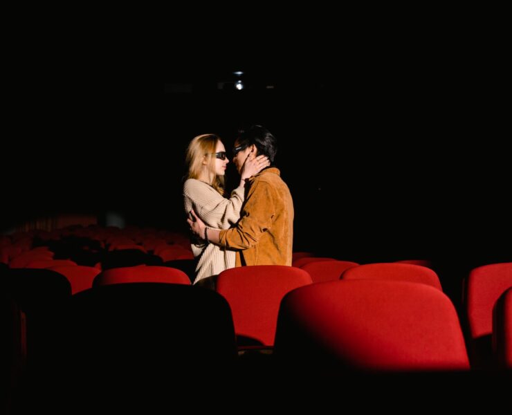 a couple kissing each other